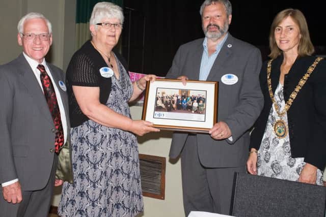 The presentation to retiring chairperson Heather Green. L-R: Mike Rigby, Heather Green, Willy Goldschmidt and Mayor of Rugby, Cllr Sally Bragg. Photo by Eddie White.
