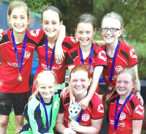 Crick Girls U12s celebrate their win at Daventry