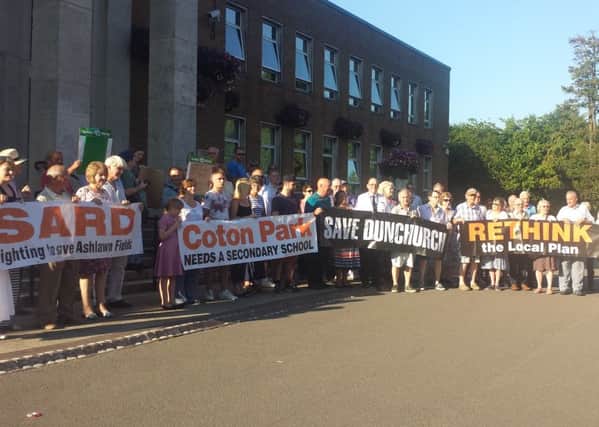 Protestors gathered outside the Rugby Town Hall on Tuesday to protest against the latest draft of the Local Plan.
