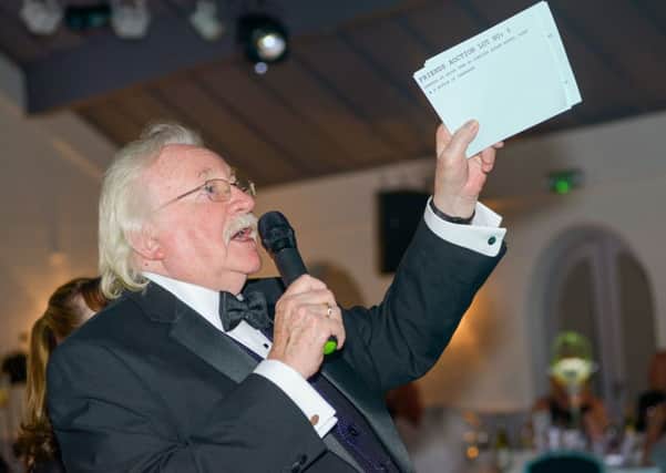 Mike Folly, the evening's auctioneer. Photo by Jamie Gray.