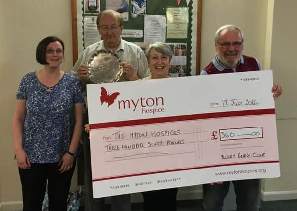 Rugby Bridge Club members with the cheque for Myton Hospices.