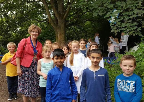 St Patrick's Primary School pupils with Leamington mayor Ann Morrison at the performance in Foundry Wood.