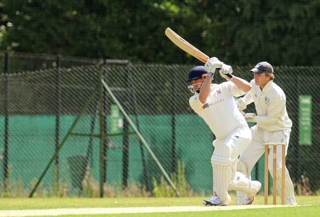 Michael Powell (pictured batting for Rugby CC back in 2014) made 101 not out against Ambleside on Saturday.