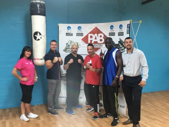 Launching Rugbys new boxing club Genesis ABC (from left) Hayley James (Impact Dance), Danny Wheldon (Main Sponsor  PAB Coventry Ltd), Andy Burbury (Coach), Craig Hartwell (Coach), Franco Wanyama (Coach) and Jon Finch (Organiser/Chairman)