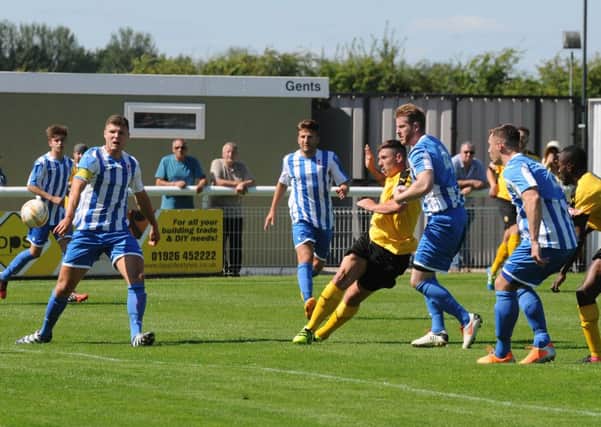 Ryan Rowe scores Brakes' fifth-minute opener on his way to a double for his new side. Pictures: Morris Troughton
