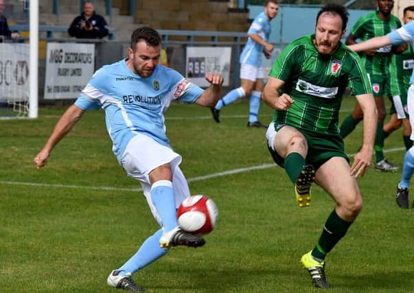 Sam Belcher clears against Bromsgrove PICTURES BY MARTIN PULLEY