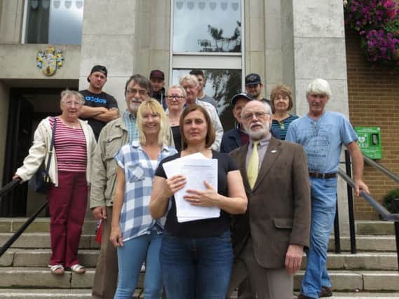 Campaigners hand over the petition