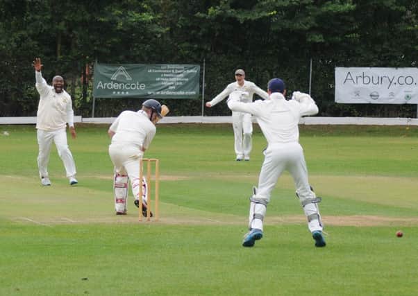 Kenilworth Wardens 2nds' Paul Henderson takes the wicket of Wellington's Alex Taylor on Saturday. Picture: Morris Troughton