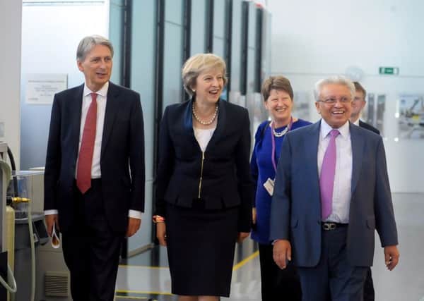 Chancellor Philip Hammond, Prime Minister Theresa May, University of Warwick Provost Christine Ennew and Professor Lord Kumar Bhattacharyya. Credit: University of Warwick