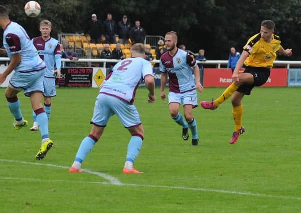 Loan signing Zak Lilly lets fly against Weymouth. Picture: Morris Troughton