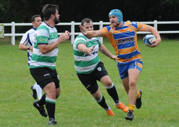 Tom Smith on the rampage for Old Leamingtonians. Picture: Morris Troughton
