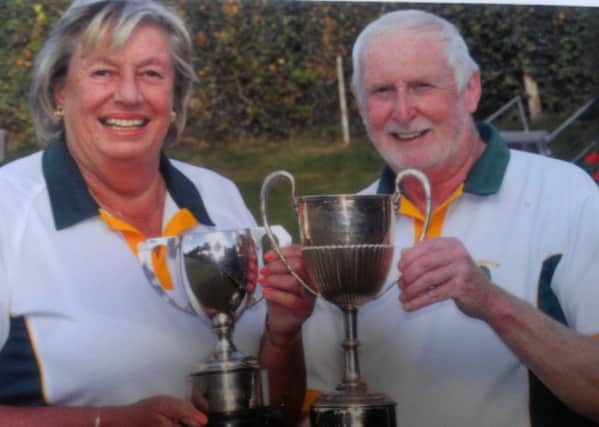 Sue Hornsby and  John Henfrey show off their trophies. Picture submitted