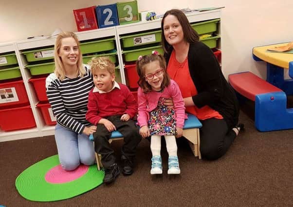 From left to right: Francesca Anker with her son Ben, and Emily Naismith with her daughter Chloe