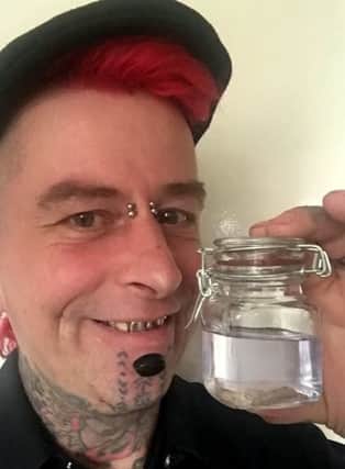 A mad-cap circus performer who cut off his own EARLOBES after he stretched them too much is now selling them at a bizarre horror-themed auction. See NTI story NTIEAR.  Professional sword swallower Hannibal Hellmuerto, 41, ended up in hospital after he stretched his earlobes to an astonishing 62mm (2.4ins).  He did it as part of his 'body modification programme' which has also left him with a forked tongue, floating ribs, over-sized teeth and a body covered in tattoos.  But as the skin around the earlobes got thinner he became concerned it would rip.  Hannibal, who is originally from Germany and performs in the Circus of Horrors, attempted to superglue the dangling skin but the adhesive wore off.  His only option was to have his earlobes sliced off and stitched back together.  But after his operation he pickled the remaining skin and is now selling the remains at auction.