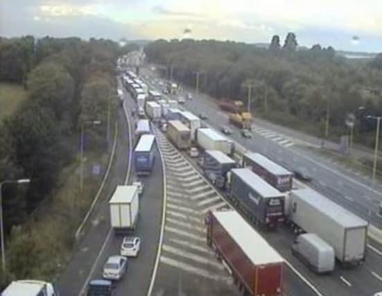 Motorists are facing eight miles tailbacks on the M1 in Northamptonshire
