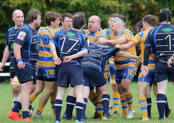 Tempers fray during the closing stages of OLs' home clash with Rugby St Andrews. Pictures: Tim Nunan