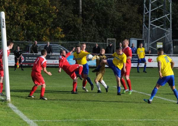 Southam United try to force the ball home in the first half of their clash against Stafford Town. Picture: Morris Troughton