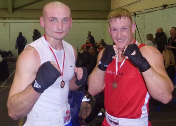 Royal Leamington Spa ABC's Mariusz Piwonar with quarter-final opponent Liam Carlin. Picture submitted