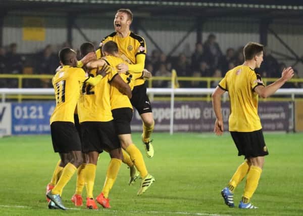 Jamie Hood joins the celebrations for Connor Gudger's winner. Picture: Tim Nunan