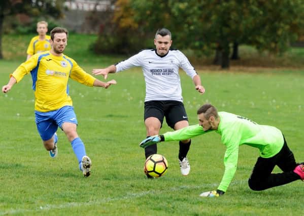 Action from Castle Rangers' Division Four Cup second round tie at home to Hampton Magna. Pictures: Mike Baker