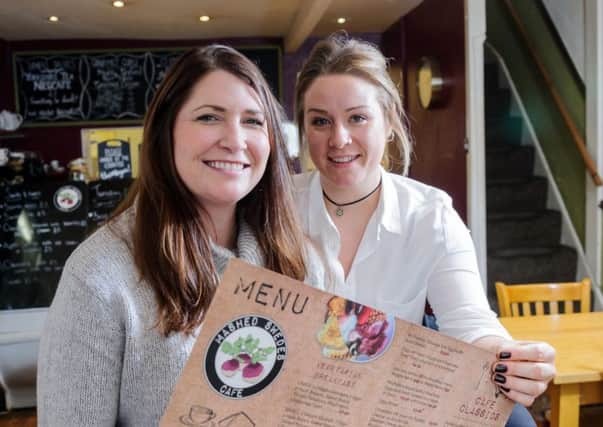 A Go Fund Me page was recently set up by Kate Livingston for her friend Sophie Eades, who runs Mashed Swedes Cafe. The cafe was burgled , with all the takings for a busy weekend stolen and now people are making donations to make up for the loss.
Pictured: Kate Livingston & Sophie Eades. NNL-160111-221653009