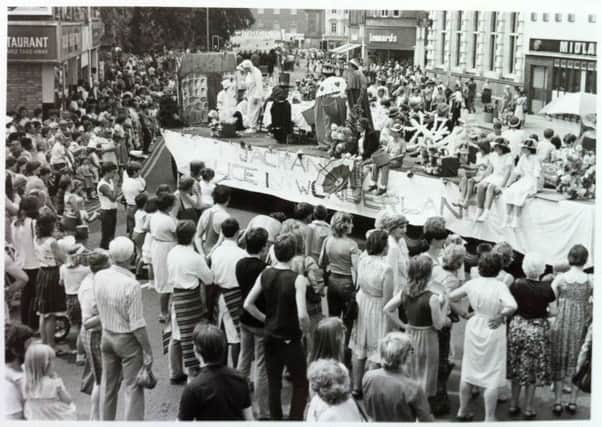The Rugby Charities Shop float in Rugby Carnival, possibly in the early 1980s