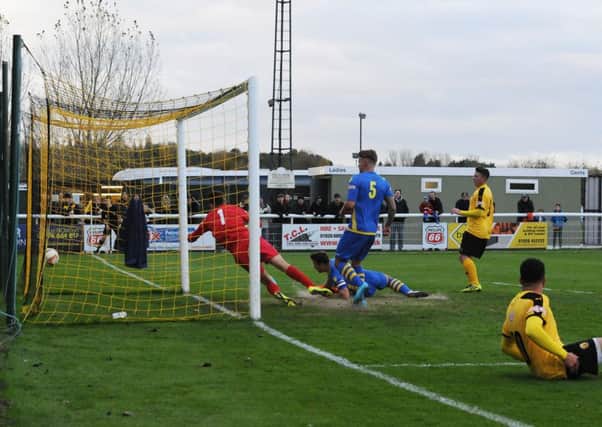 The ball hits the back of the net for Brakes second. Pictures: Morris Troughton