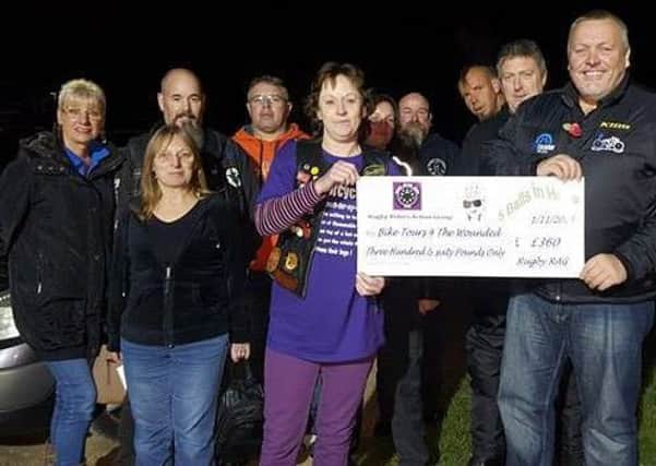The money is presented to charity.