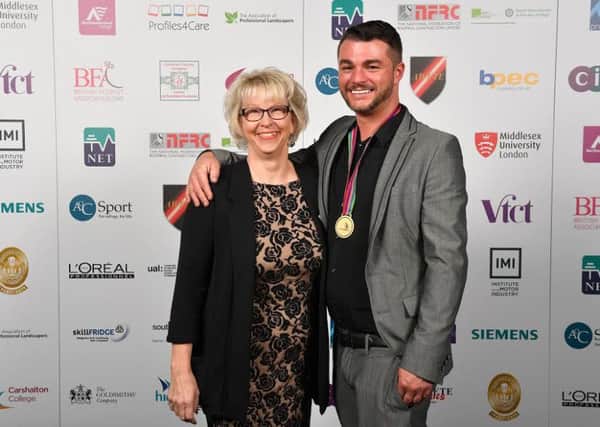 Dean Sharpe with British Florist Association events manager Sarah Cunningham, who presented him with his gold medal. NNL-161129-153132001