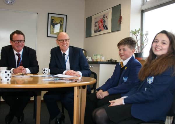 From L-R: Chris White MP, Nick Gibb MP and Campion School pupils George Rudd and Indigo Hancock.