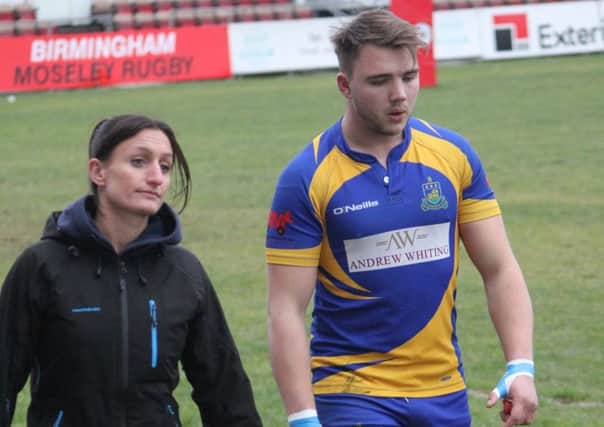 Ed Hannam is led off the pitch after picking up an injury in the opening skirmish. Picture: Wilie Whitesmith