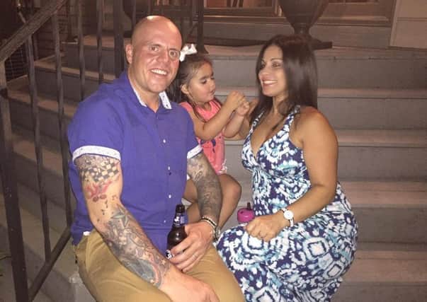 Andrew McLaughlin with his pregnant wife Wanda and daughter Gracie. o6inrvxW0CrPGOy6GWK-
