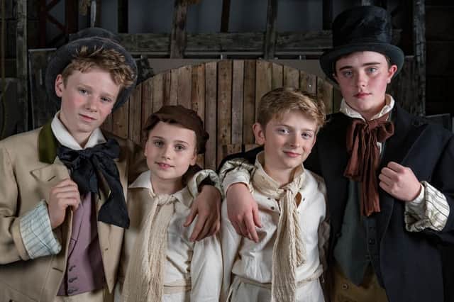 Aaron Crockford, Megan Bignall, Oscar George and Nathan Woolley as the Artful Dodger and Oliver. Picture by Richard Smith.