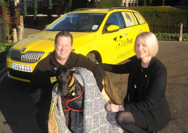 From left: David Evans of Kenilworth Dogs Trust and head housekeeper at Coombe Abbey Hotel Carron Brown