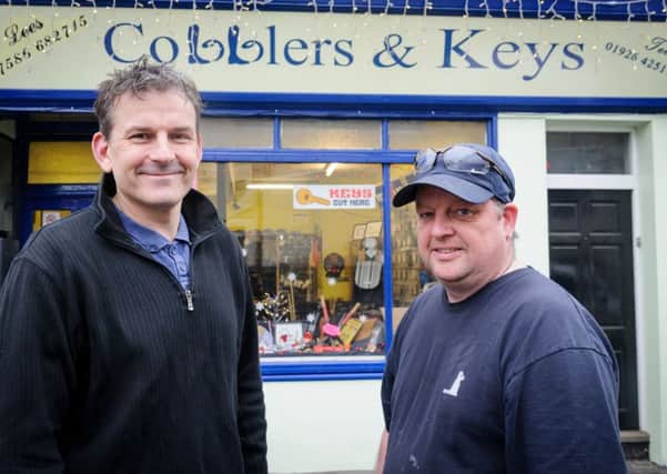 The business has been recently taken over by former employee Lee Baker and the Old Town Team have supplied funding for a newly refurbished sign.

Pictured: Lee Baker & Jeremy Ireland (Member of the Old Town Team). NNL-160612-195007009