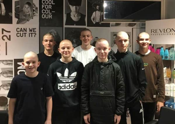 The seven Kenilworth School pupils after braving the shave at Room 27 in Warwick Road.
