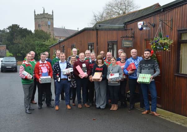 Staff from O'Brien Contractors based in Cubbington wearing their Christmas jumpers to raise money for the Way Ahead Project.