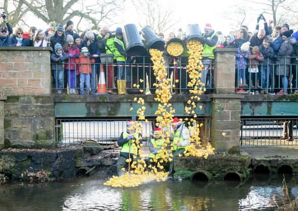 Crowds gather for the annual Boxing Day Kenilworth Duck Race, in Abbey Fields. NNL-161226-163422009