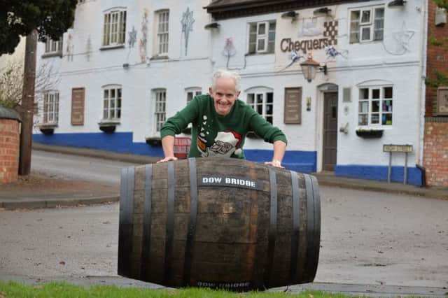 Landlord Brian Priest of the Chequers pub in Swinford gets ready for the charity barrel roll for Diabetes UK on the 8th January 2017.
PICTURE: ANDREW CARPENTER