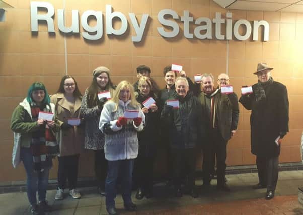 Rugby Labour members protesting about fare rises. NNL-170401-123140001