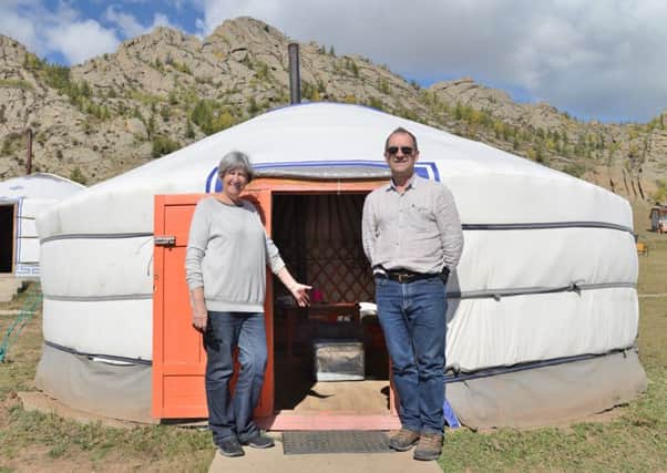 Susan Evans, left, with Raymond Evans in the Gorkhi-Terelj National Park in Mongolia. Copyrigh: Irwin Mitchell