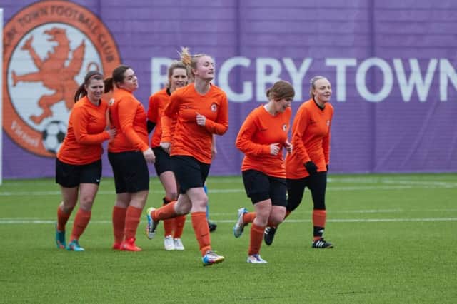 Rugby Town Ladies celebrate their first goal against Rubery