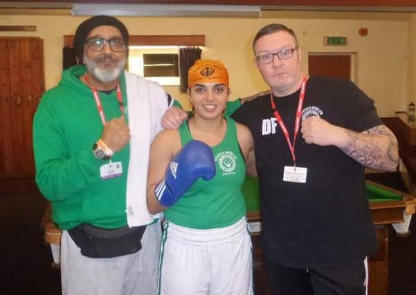 Lisa Dhesi with coaches Babs Kandola and Derek Fitzpatrick. Picture submitted