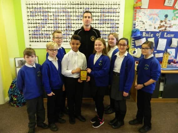 Ian Smart with pupils at Boughton Leigh Junior School