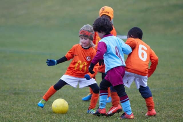Rugby Town U7s playing Hillmorton last month   (Picture by Brian Dainty)
