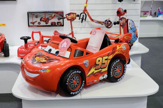 A ride-on replica of Cars' Lightning McQueen has been tipped as one of 2017's top toys - despite costing a whopping Â£200. The pricey battery-powered car - complete with 'Lightyear' printed wheels - has a maximum speed of just 3km/h. See National News story NNTOY; A ride-on replica of a Disney toy car has been tipped as one of 2017s top toys - despite costing a whopping Â£200. The pricey battery-powered Cars' Lightning McQueen vehicle - complete with 'Lightyear' printed wheels - has a maximum speed of just 3km/h. Other pricey picks included a wooden 'Forest Cottage', a 40,000 piece Disney Moments puzzle, and a controversial 'hover board' - all at a mind-boggling Â£400. The toys were on display as part of Britain's biggest toy show, Toy Fair, taking place at Olympia Exhibition Centre in Kensington, west London.