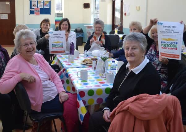 SWIFT Living members celebrate their first year and the funding boost from the Peoples Postcode Lottery