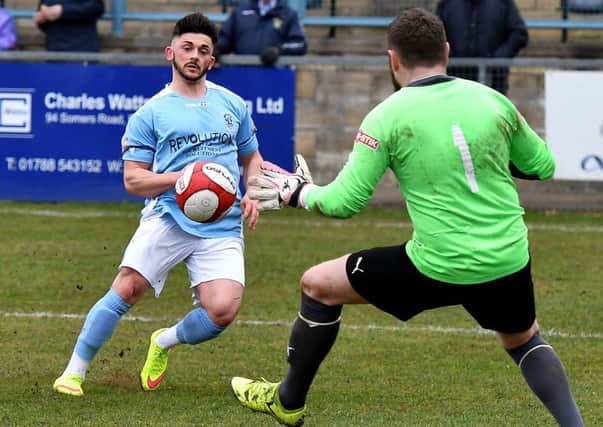 Callum Powell in goalscoring action for Rugby Town.
