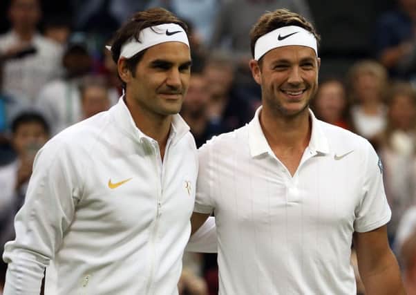 Marcus Willis with Roger Federer ahead of their Centre Court clash.