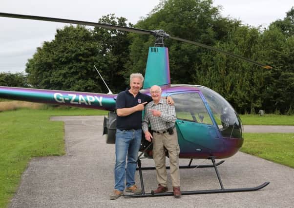 From left: David Monks with Russell 'Rusty' Waughman after they touched down in Wellesbourne
